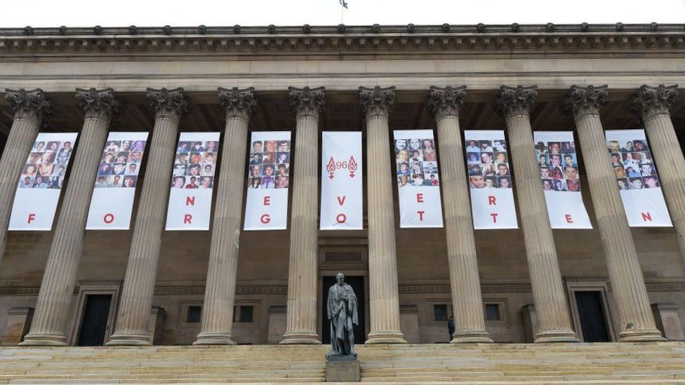 Banners with images of the 96 victims have been hung at St George's Hall