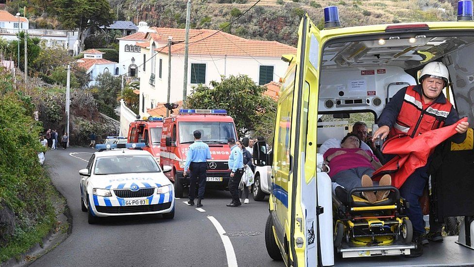 A woman receives medical treatment on April 17, 2019 in Caniço, on the Portuguese island of Madeira