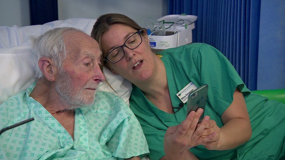 Specialist nurse Mary talks to a patient about his results