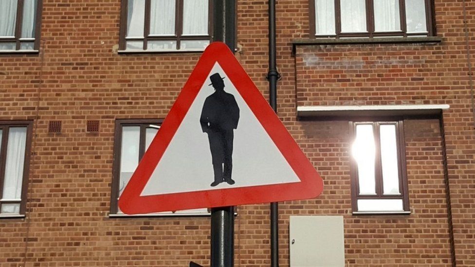 "Beware of Jews" road sign