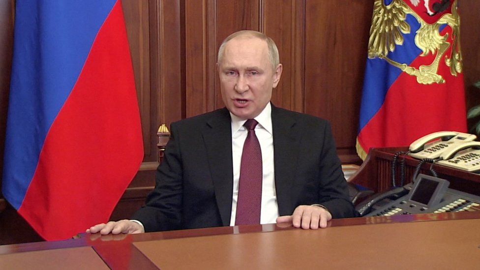 Russian President Vladimir Putin speaks about authorising a special military operation in Ukraine"s Donbass region during a special televised address on Russian state TV