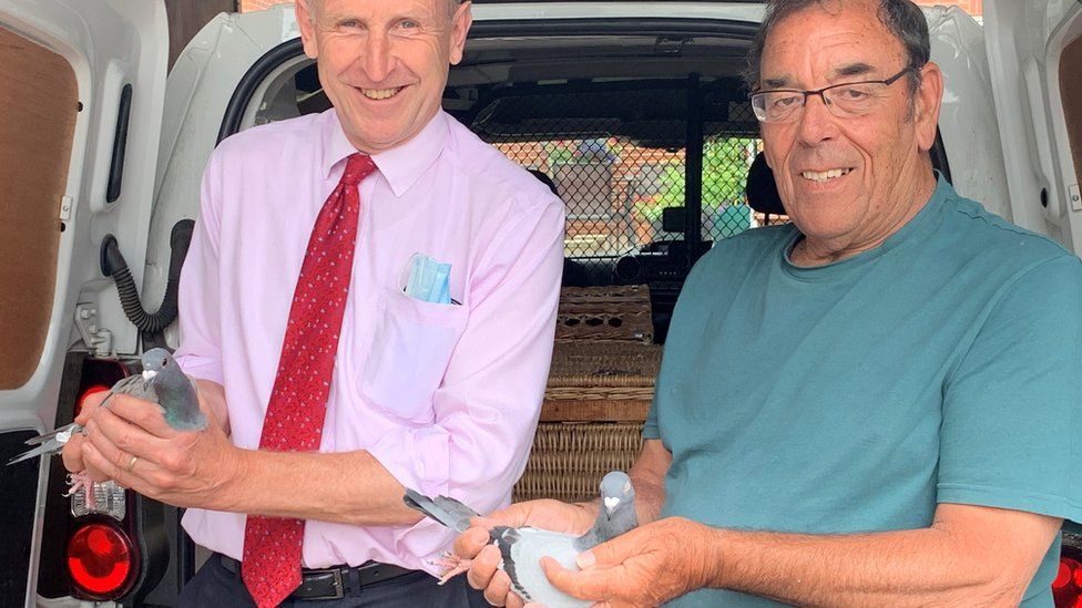 MP John Healey (left) with Mick McGrevy from Goldthorpe, who has kept racing pigeons since he was 12