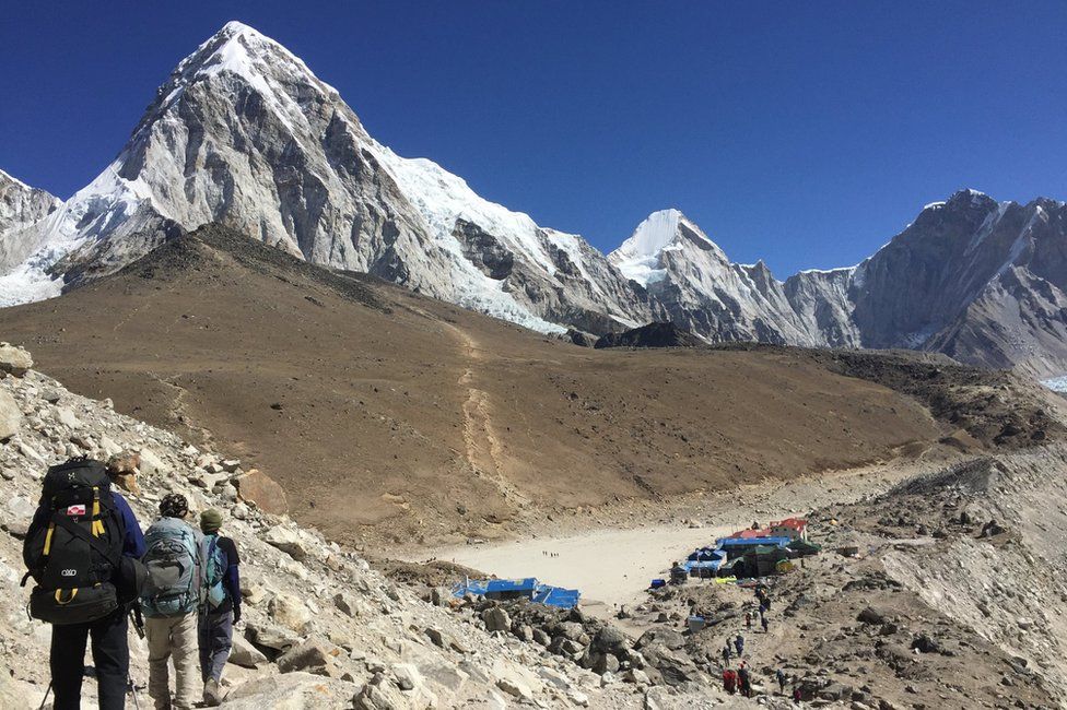 This April 10, 2016 photo shows trekkers heading to Everest Base Camp, Nepal