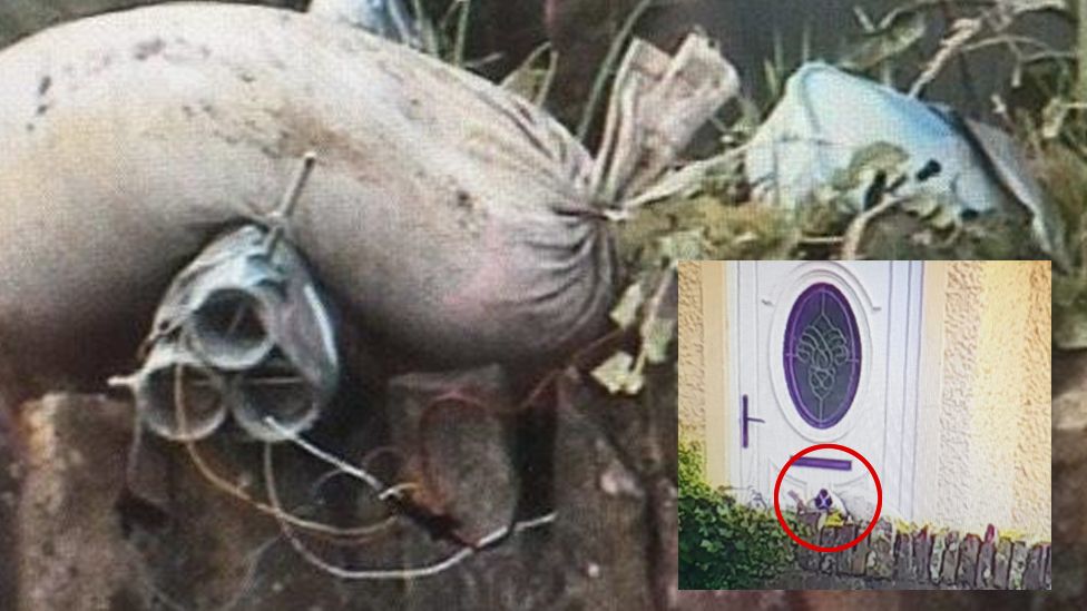 Police photos show the bomb just metres from the door of a house