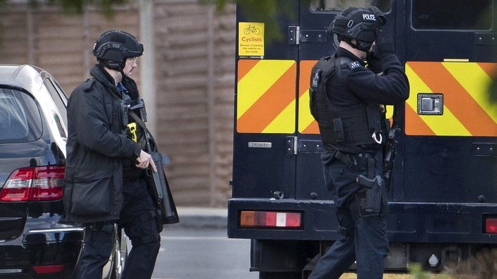 Armed police in Northolt