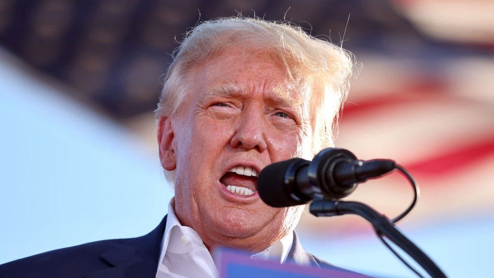 Trump speaking at a rally in October