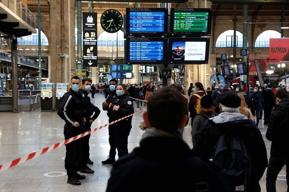 French police secure the scene after French police shot dead a man who attacked them with a knife at the Gare du Nord station in Paris, France, on 14 February 2022
