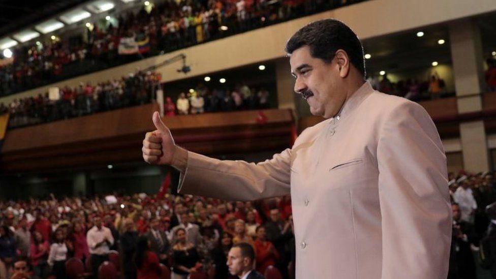 Venezuela's President Nicolas Maduro gestures as he arrives for the swearing in ceremony of the newly elected governor of Zulia state Omar Prieto (not pictured), in Maracaibo, Venezuela December 16, 2017.