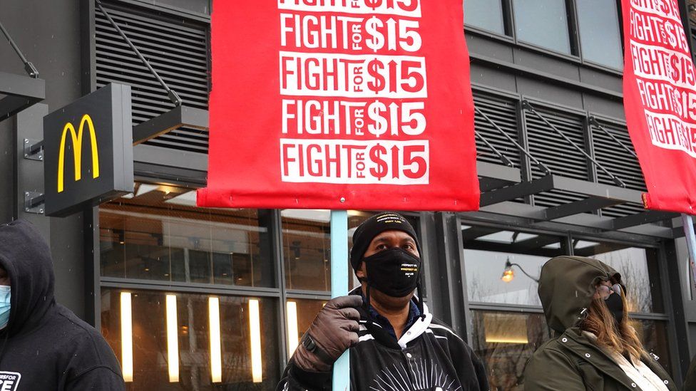 Demonstrators participate in a protest outside of McDonald's corporate headquarters on January 15, 2021 in Chicago, Illinois. The protest was part of a nationwide effort calling for minimum wage to be raised to $15-per-hour