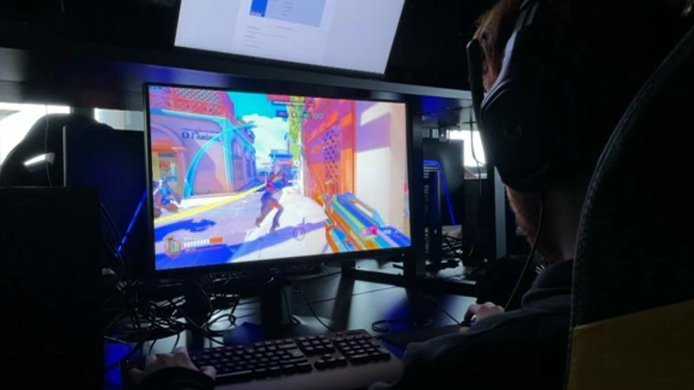 Student tries out the specialist e-Sport studio