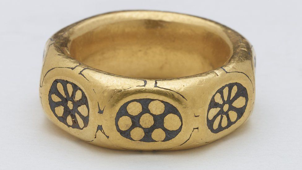 Close-up view of the gold finger ring