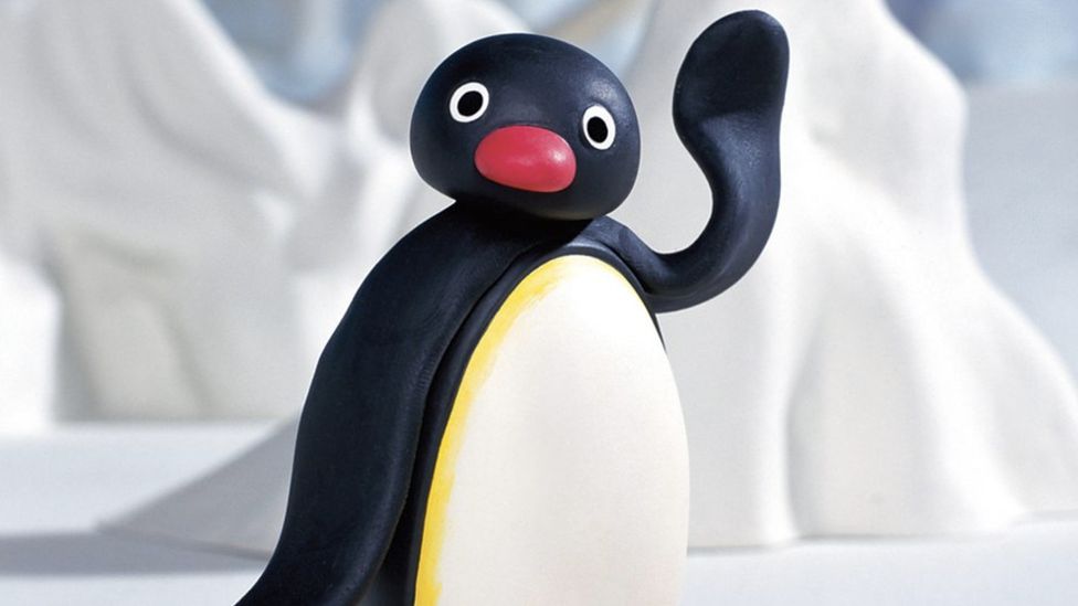 Pingu the cartoon character waving