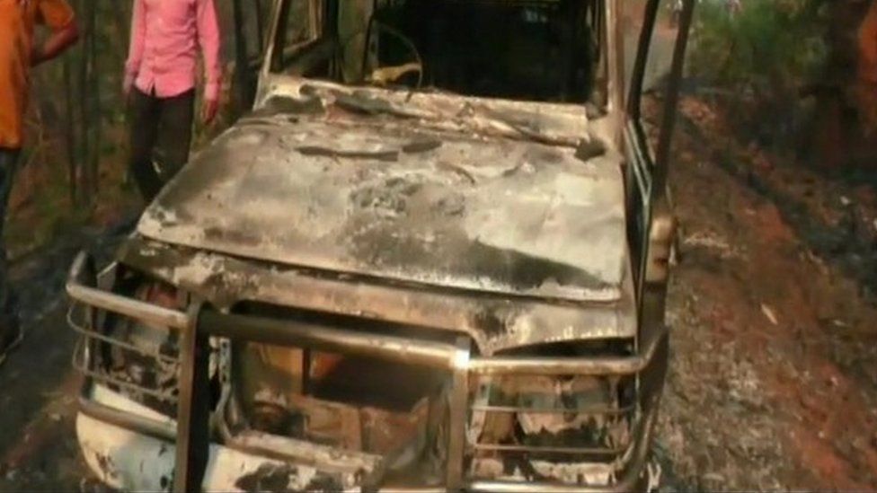 The burnt car set on fire by Maoists