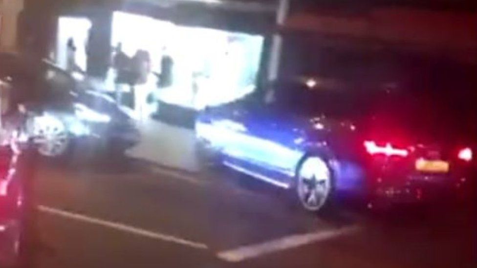 Car drives on pavement in Brentwood