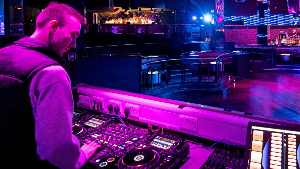 A technician in PRYZM nightclub in Birmingham, poses for a photograph in the closed superclub