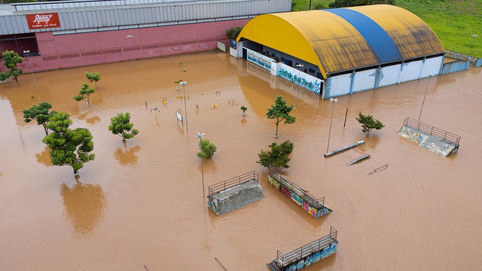 Aerial view as a sports centre is flooded in Juatuba