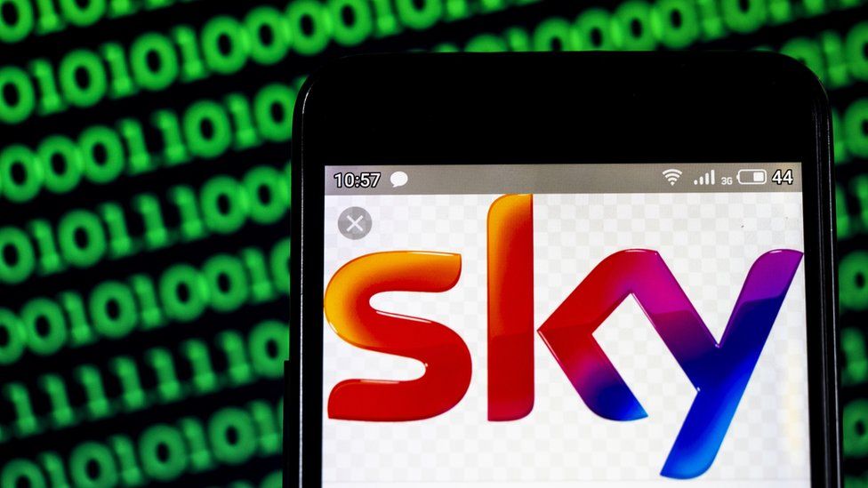 Sky logo on a mobile phone on a digital background