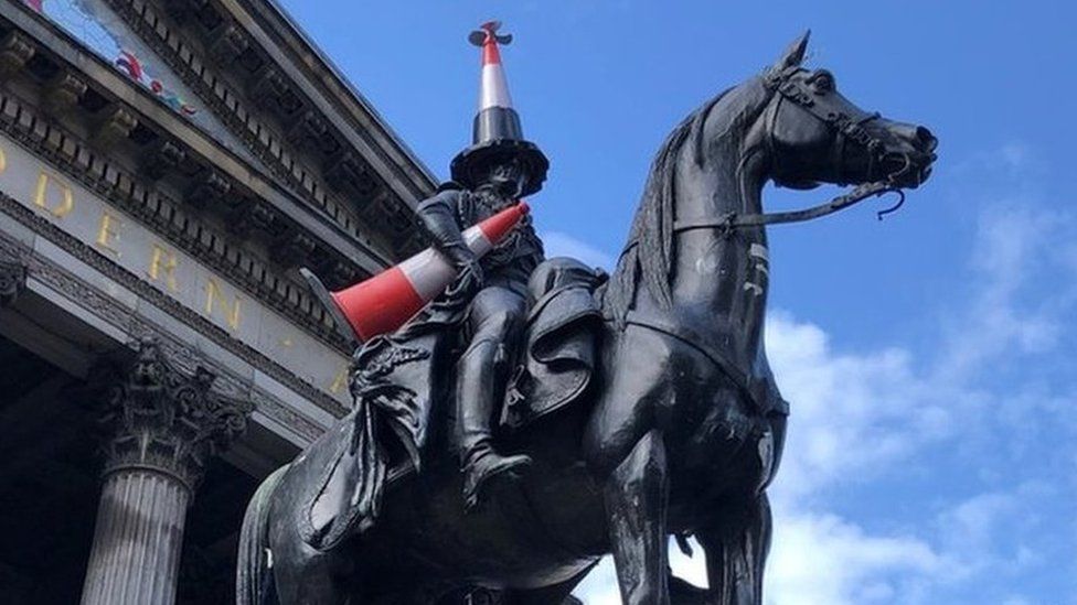 Duke of Wellington statue with a cone with a propeller on top