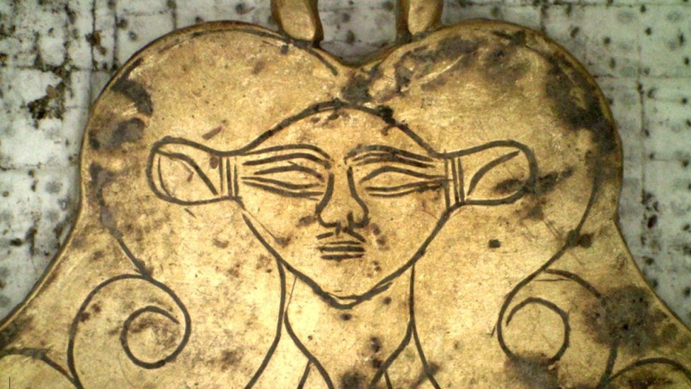 A pendant depicting the head of ancient Egyptian goddess Hathor