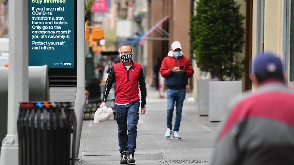 New York City residents wear masks amid virus outbreak