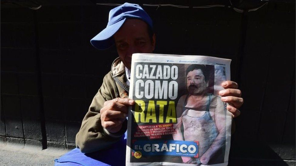 A street vendor shows a newspaper in Mexico City with a picture of drug kingpin Joaquin "El Chapo" Guzman on its front page on 9 January , 2016 a day after he was recaptured during a military operation in Los Mochis, Sinaloa State