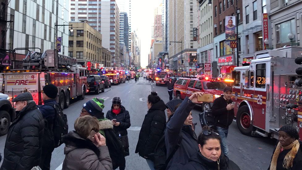 Police and fire crews block off the streets near the New York Port Authority in New York City