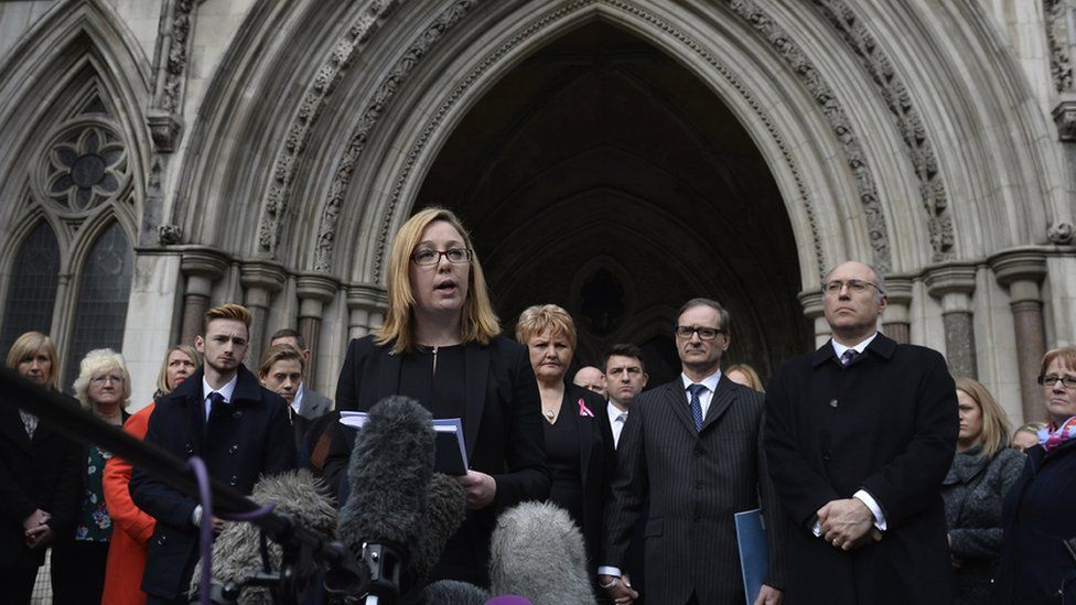 Solicitor Kylie Hutchison reads a statement on behalf of the relatives of the victims outside the Royal Courts of Justice in London