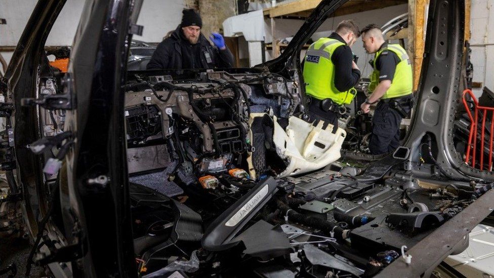 Police officers at a so-called chop shop in Balsall Heath