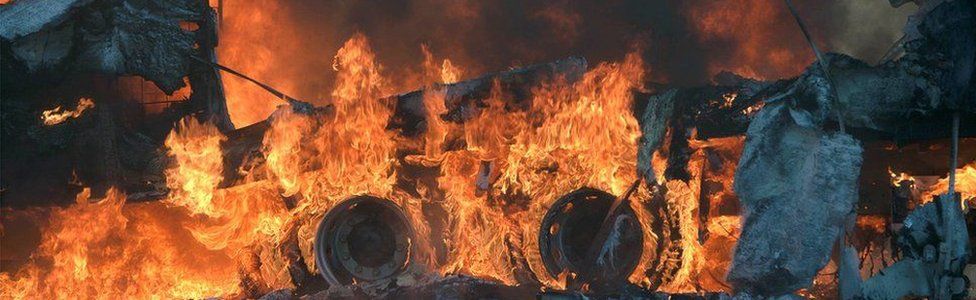 A burning bus during the Tshwane ritos in South Africa - June 2016