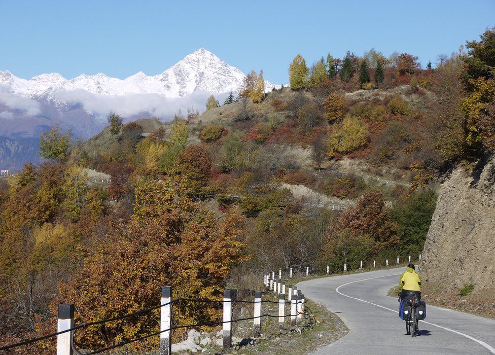 Cycling through an autumnal landscape in Georgia
