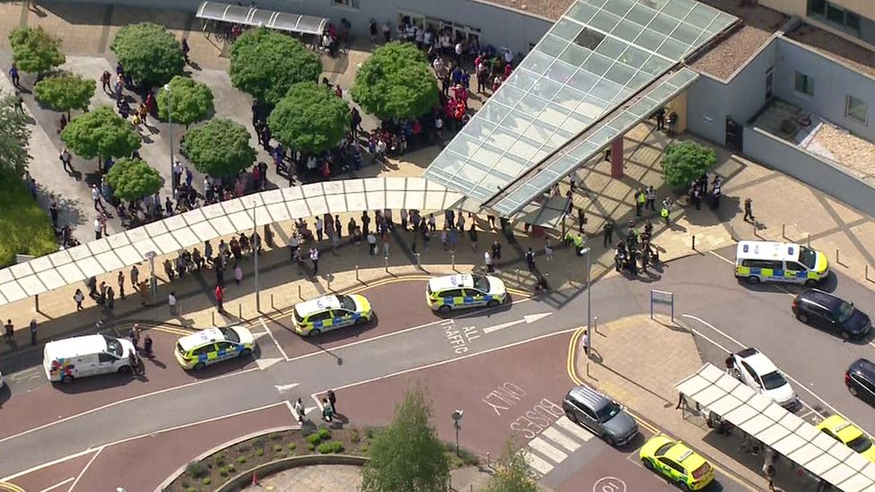 Armed police are on the scene at Central Middlesex Hospital