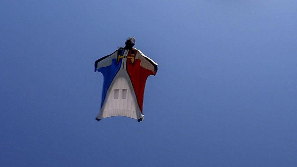 File photo of a skydiver going through clear skies