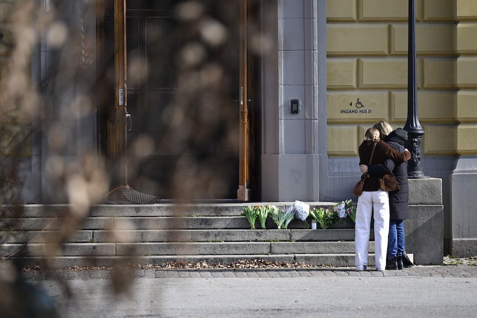 Mourners outside the school in Malmo