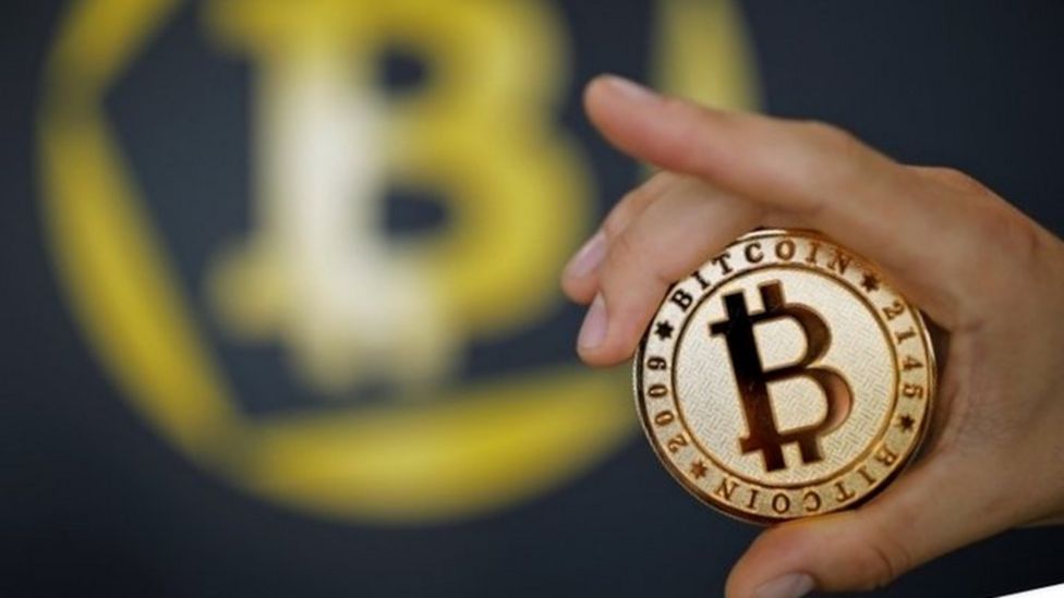Bitcoin splits as new currency takes off BBC News
