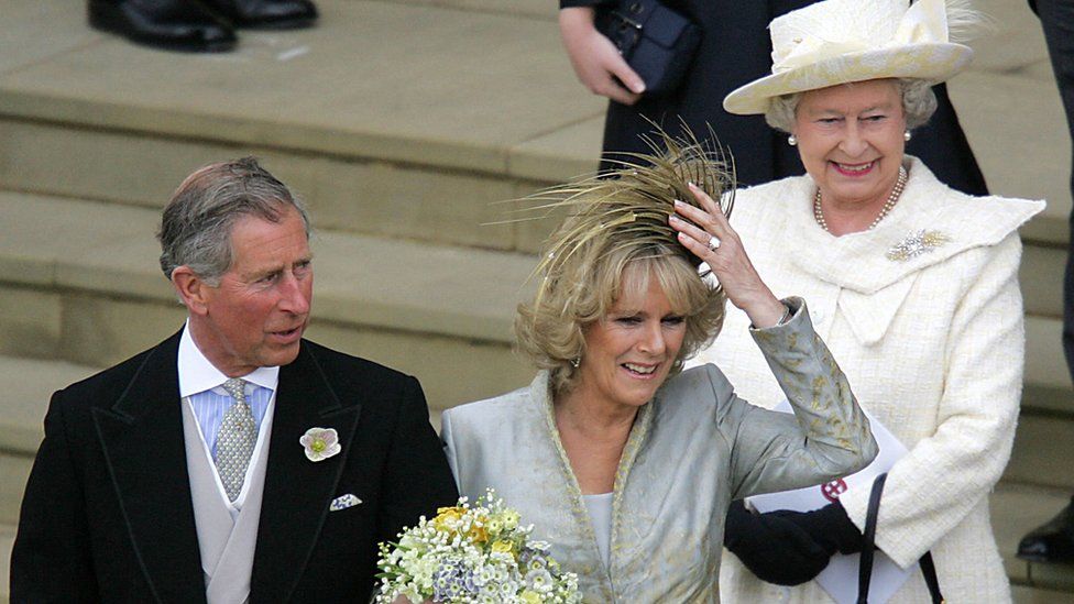 Prince Charles and the Duchess of Cornwall, formerly Camilla Parker Bowles, are followed by Queen Elizabeth II after the blessing ceremony at the St George's Chapel at Windsor Castle 09 April 2005. Prince Charles and his longtime sweetheart Camilla Parker Bowles married today after two months of muddled preparations and a lifetime of waiting.
