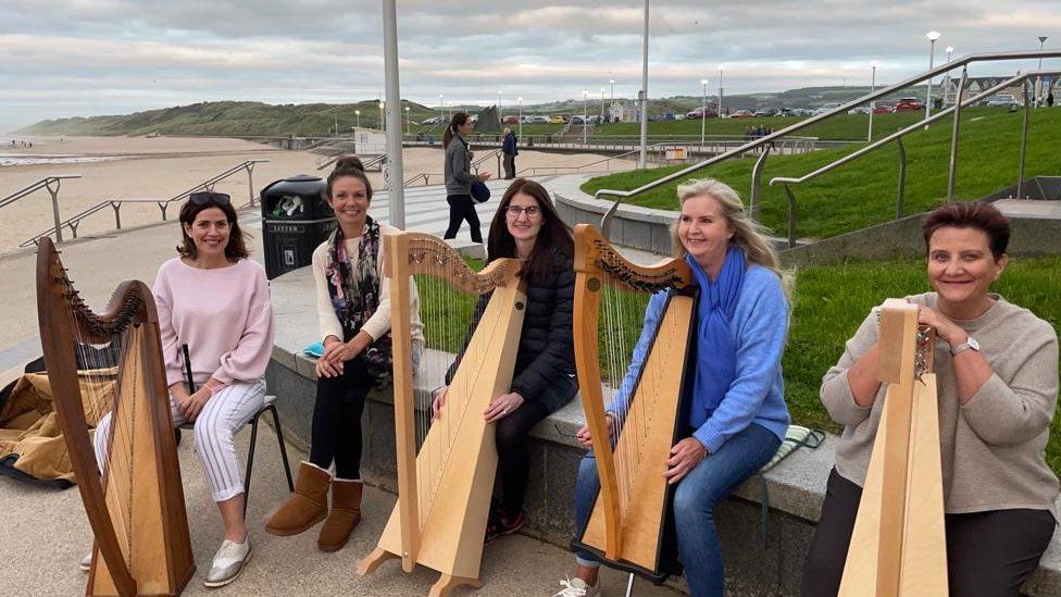 Katy Bustard (second from left) and some of her harp students, including Ailish McFarlane (second from right)
