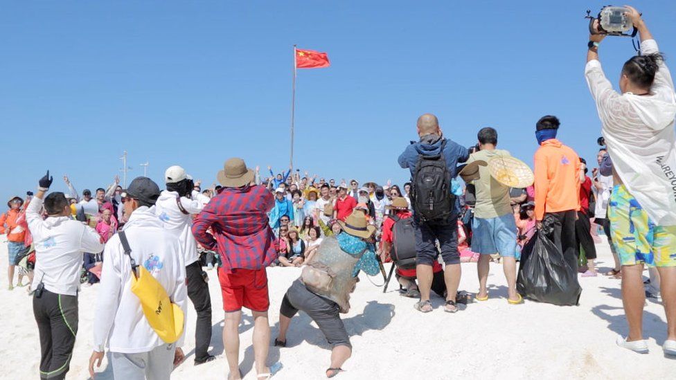 Flag raising ceremony on Quanfu Island, Paracel Islands.