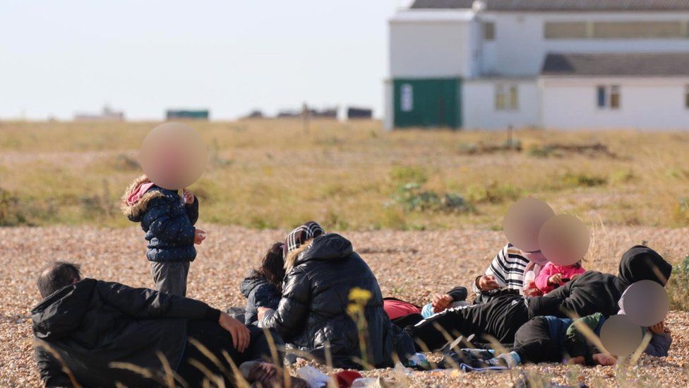 Migrants on Dungeness beach