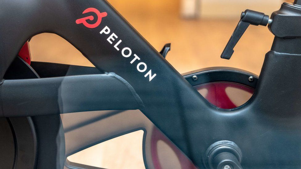 Peleton's logo is seen on the frame of its exercise bike in this photo
