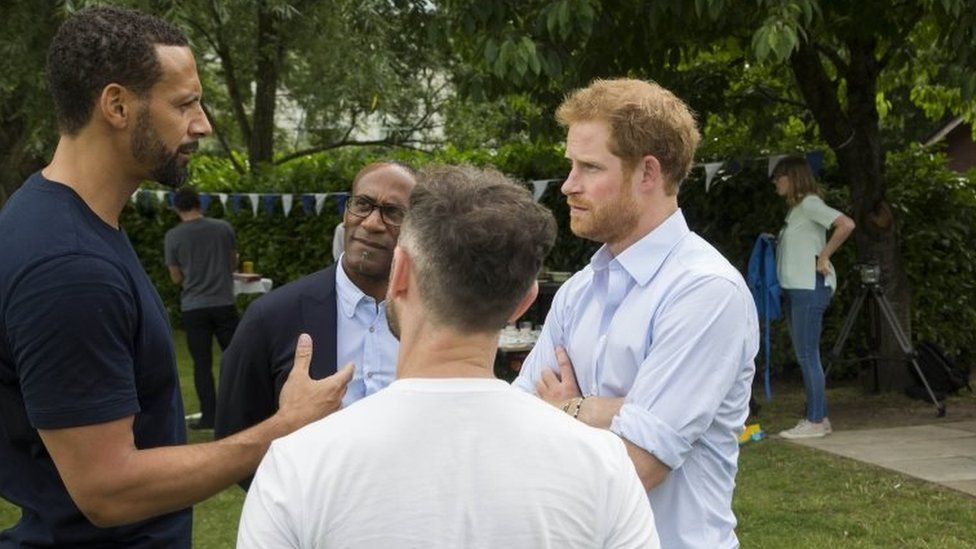 Handout photo issued by the Royal Foundation of (left to right) Rio Ferdinand, Julian Ferdinand (Rio's father), Prince Harry and Ben Brooks Dutton at the Heads Together barbecue at Kensington Palace in London