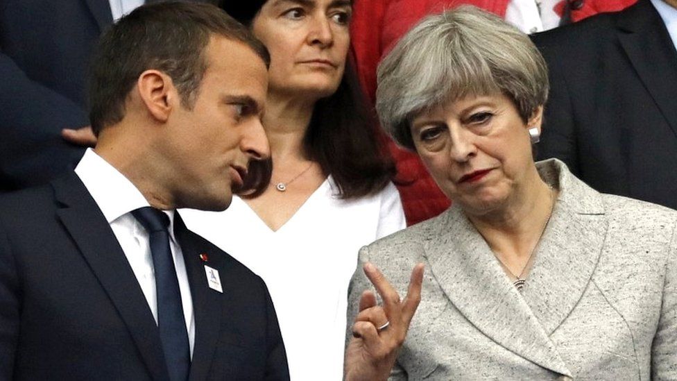 Emmanuel Macron and Theresa May at the Stade de France in Paris on 13 June 2017