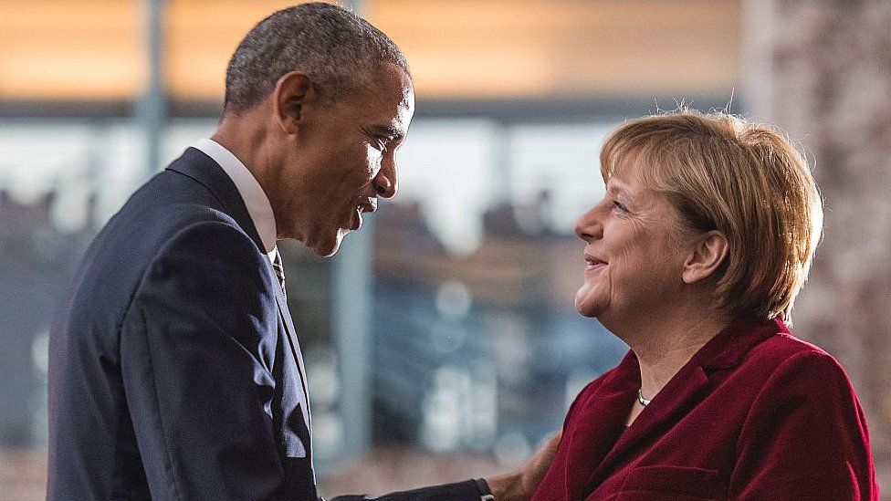 Barack Obama is greeted by German Chancellor Angela Merkel upon arrival at the chancellery on November 17, 2016 in Berlin