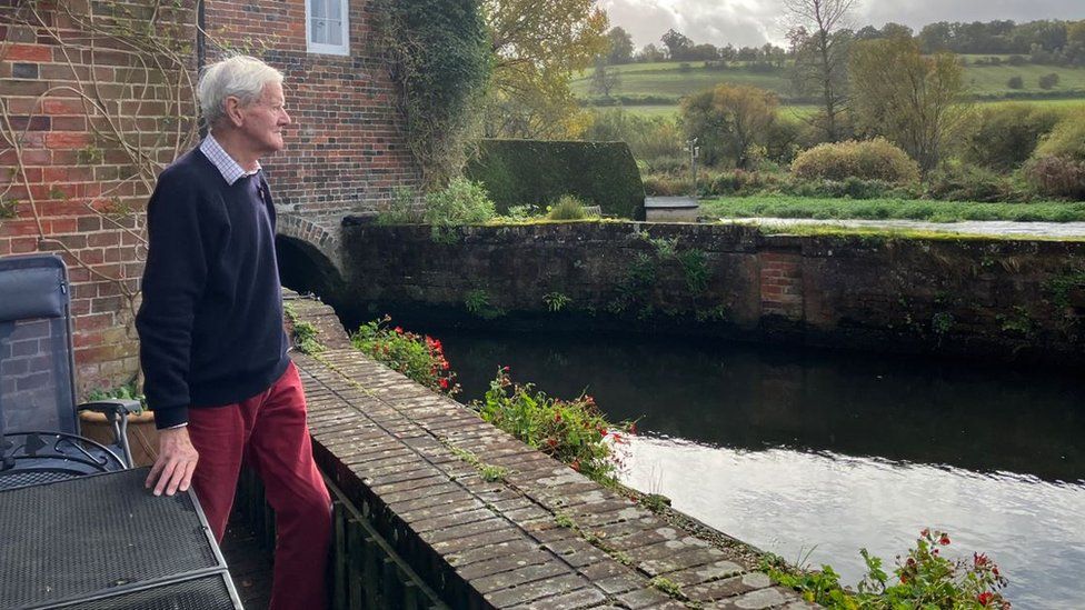 Gordon Pepper with the river in the background