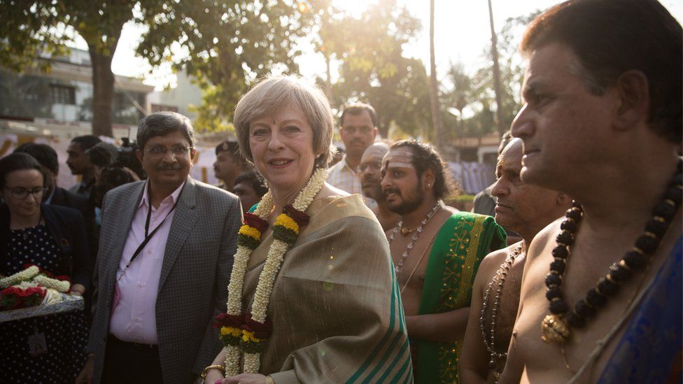 British Prime Minister Theresa May is welcomed to the Sri Someshwara Temple on November 8, 2016 in Bangalore, India. Mrs May is in India on a two-day trade mission to reconnect the UK with the Commonwealth