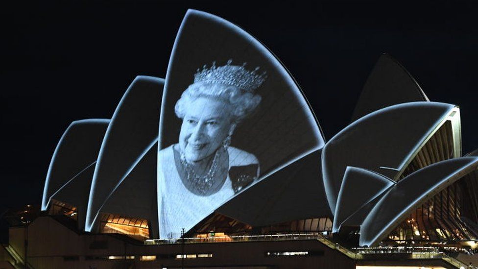 An image of the Queen is projected on to the Sydney Opera House