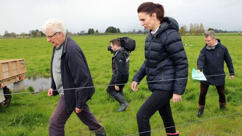 New Zealand Prime Minister Jacinda Ardern visits a farm to announce the government's proposals to tackle climate change