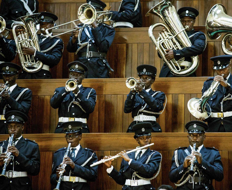 Uganda"s police band performs before President Yoweri Museveni gives a state of security address during a special session of the Parliament in kampala on June 20, 2018