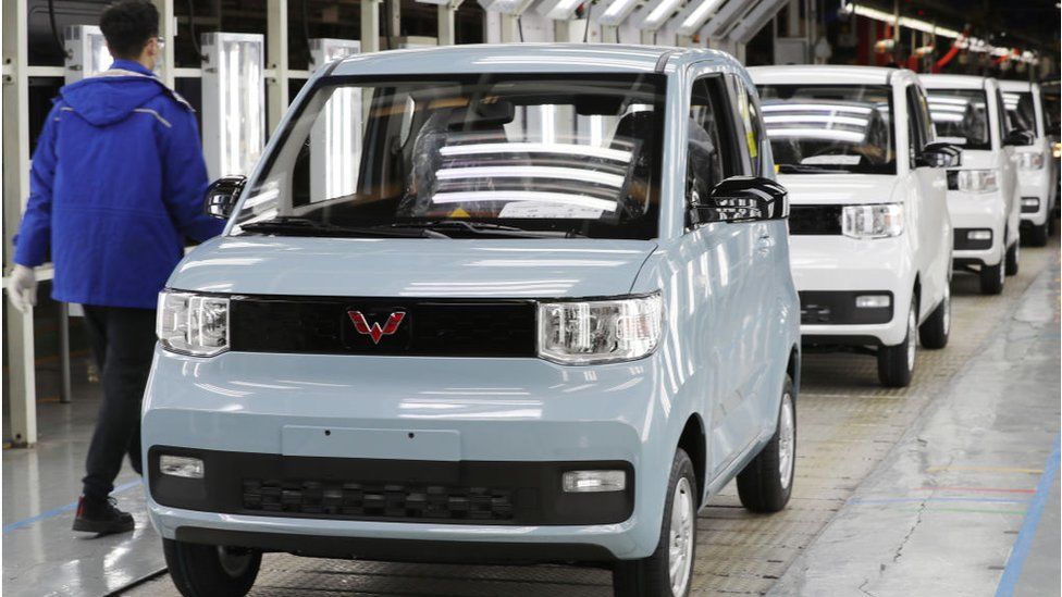 Chinese 3 200 Budget Electric Car Takes On Tesla BBC News