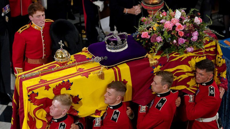 Pallbearers with the late Queen's coffin