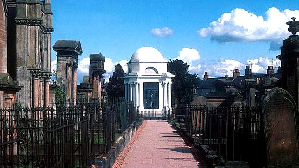 The white mausoleum building